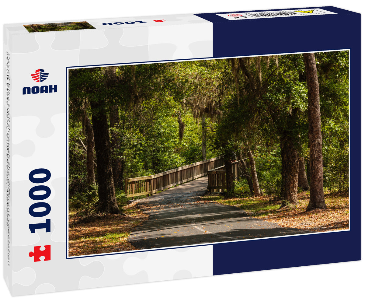 Paved bike trail through the different vegetation at Gulf State Park, Gulf Shores, Alabama