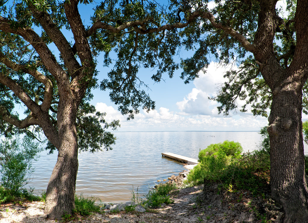Small pier on Mobile Bay near Gulf Shores Alabama USA