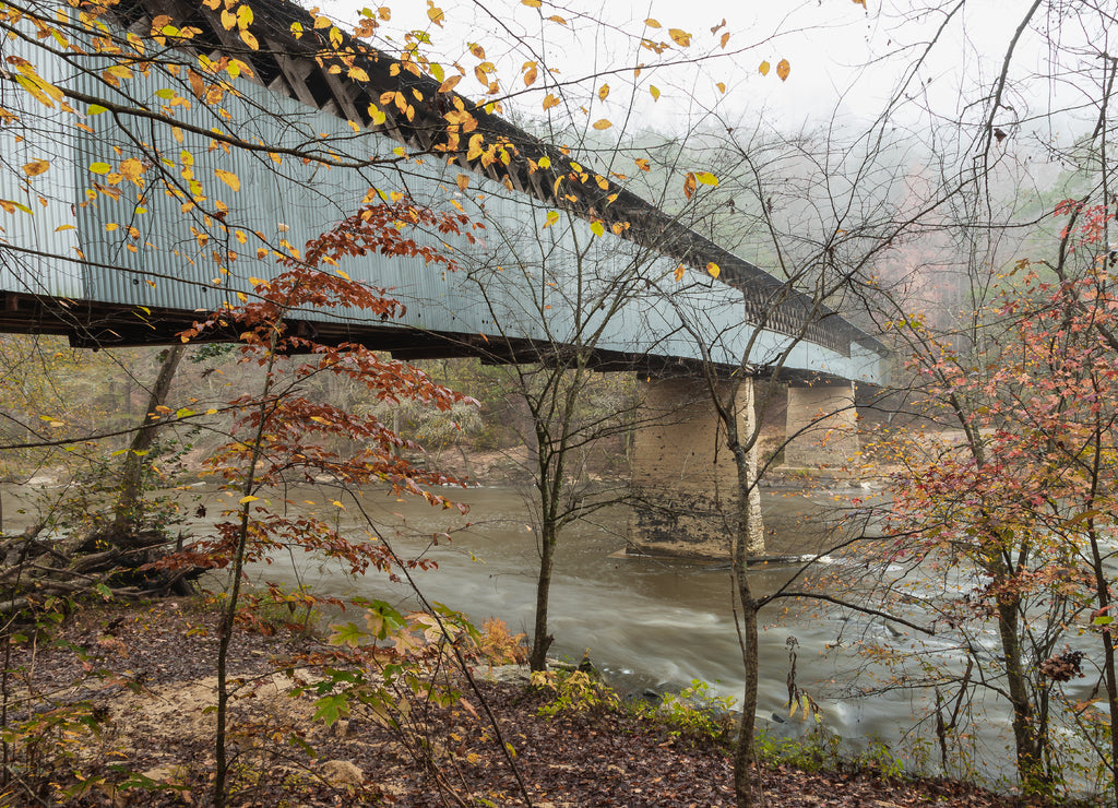 Swann Covered Bridge in Blount County Alabama in the Autumn fog