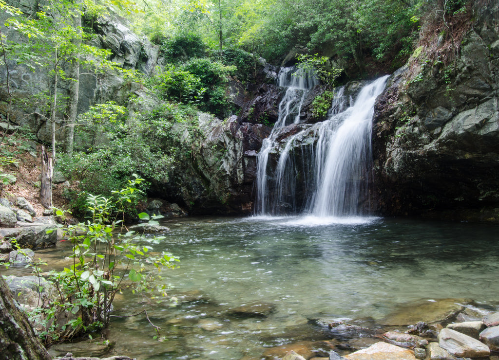 Summertime morning view of a waterfall in the Talladega National Forest near Ashville and Lineville, Alabama, USA