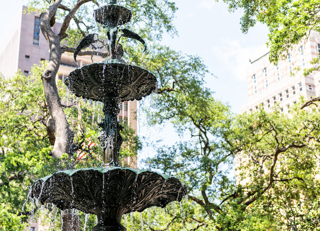 Mobile, USA Old town Bienville square park by street in Alabama famous southern town, closeup of water fountain spraying drops splashing