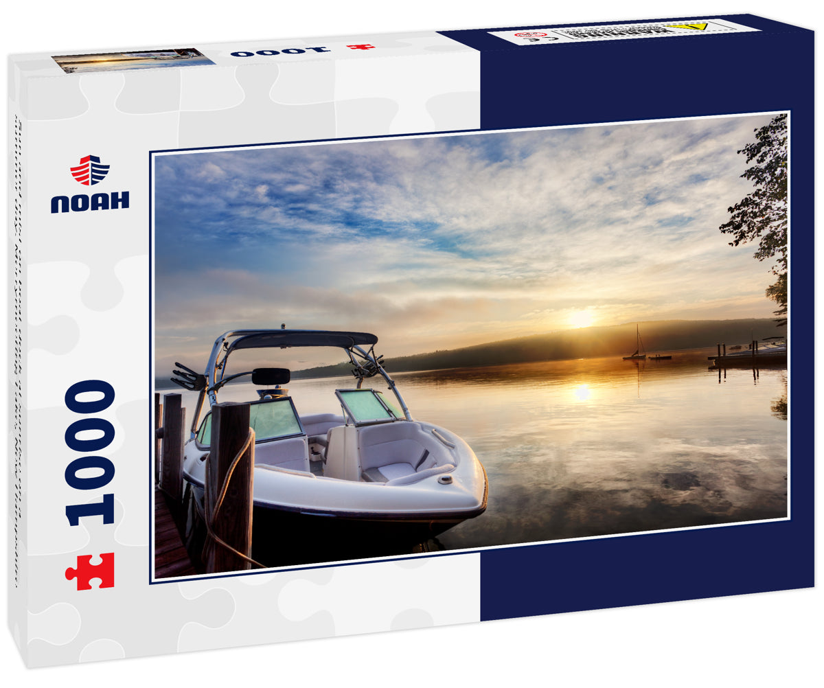 Sun and mist on boat dock at sunrise on a summer day. Merrymeeting Lake, New Hampshire