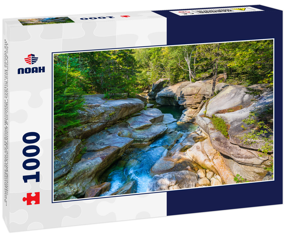 The Ammonoosuc river in a canyon among granite stones in the forest, flowing from Mount Washington in the White Mountain National Forest in New Hampshire