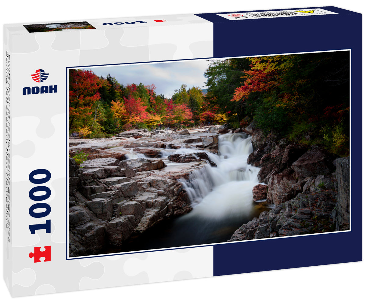 Swift river at rocky scenic gorge area during fall season, New Hampshire