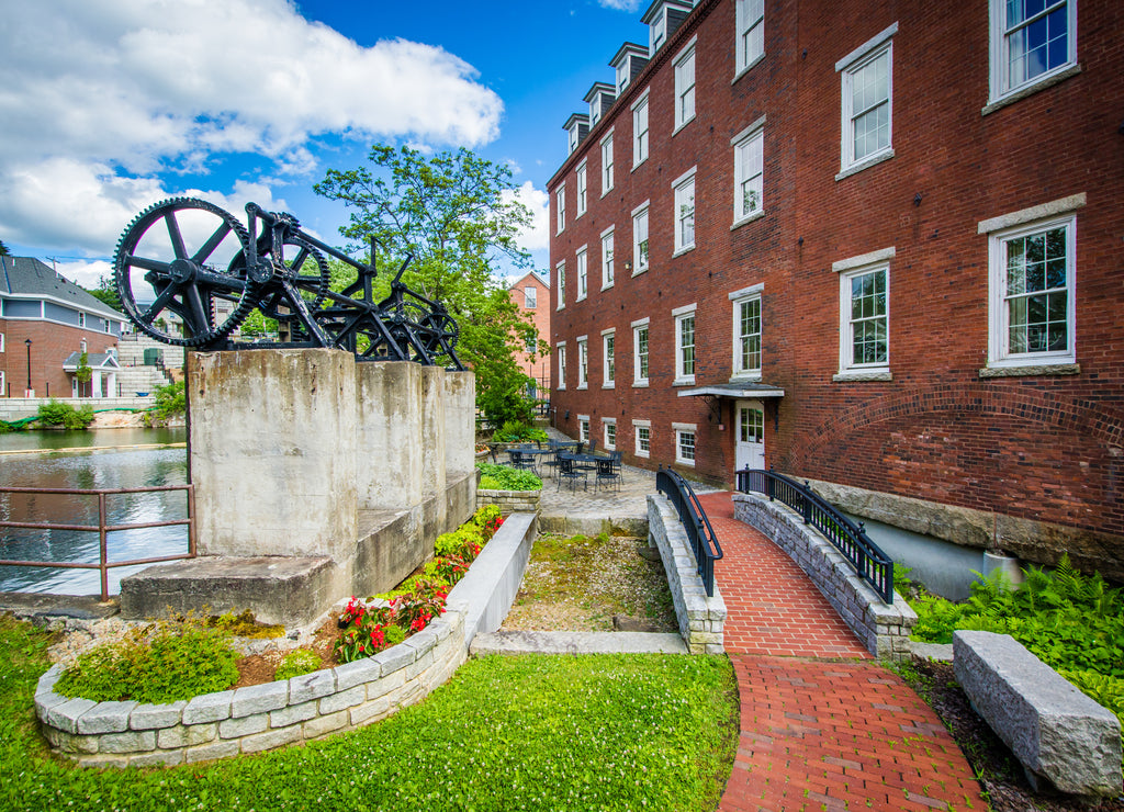 The Busiel Mill Building and Winnipesaukee River, in Laconia, New Hampshire