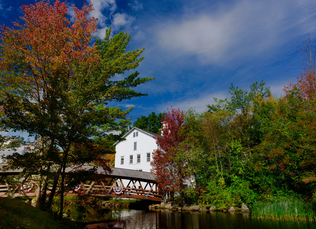 Sunapee harbor covered bridge and typical New England house and tree, New Hampshire