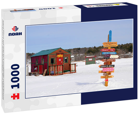 Signs point the way to a multitude of ice fishing shacks on Lake Winnipesaukee, New Hampshire