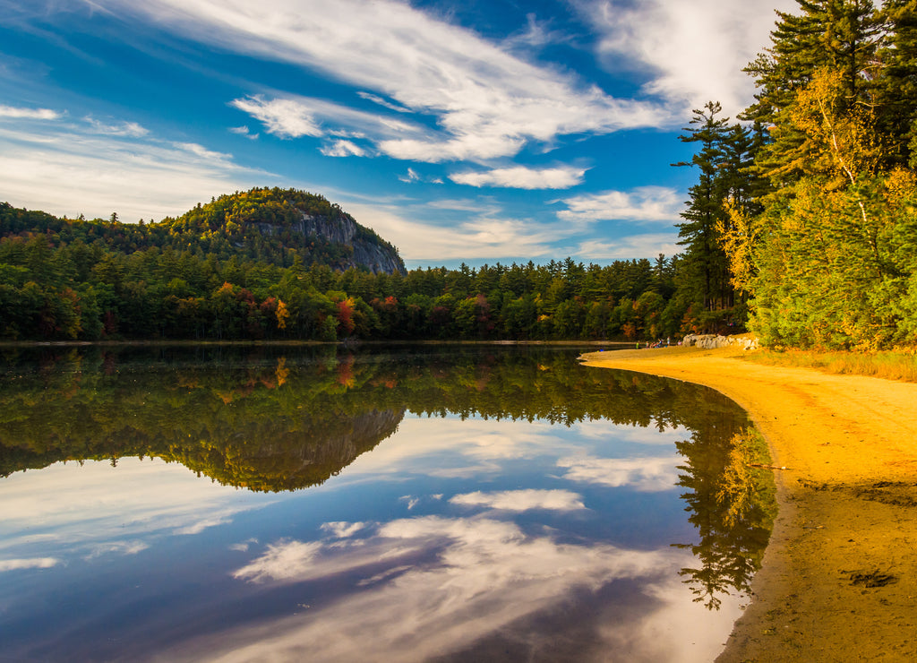 Early fall color and reflections at Echo Lake in Echo Lake State, New Hampshire