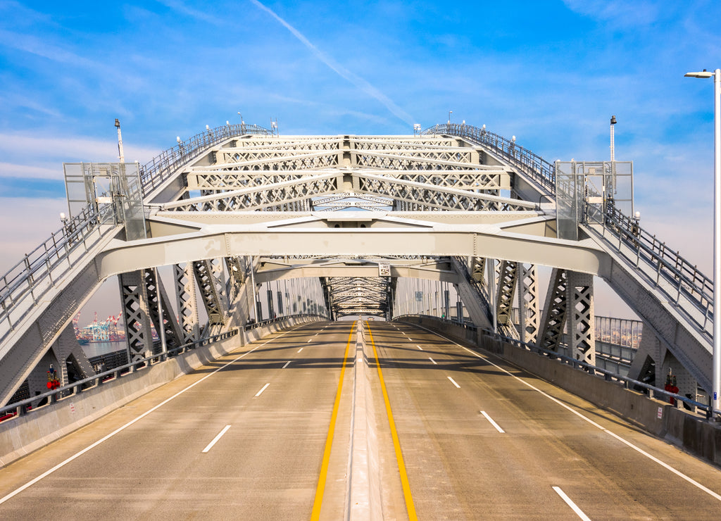 The newly raised Bayonne Bridge viewed from road level. The Bayonne Bridge is an arch bridge spanning the Kill Van Kull connecting Bayonne, New Jersey with Staten Island, New York City