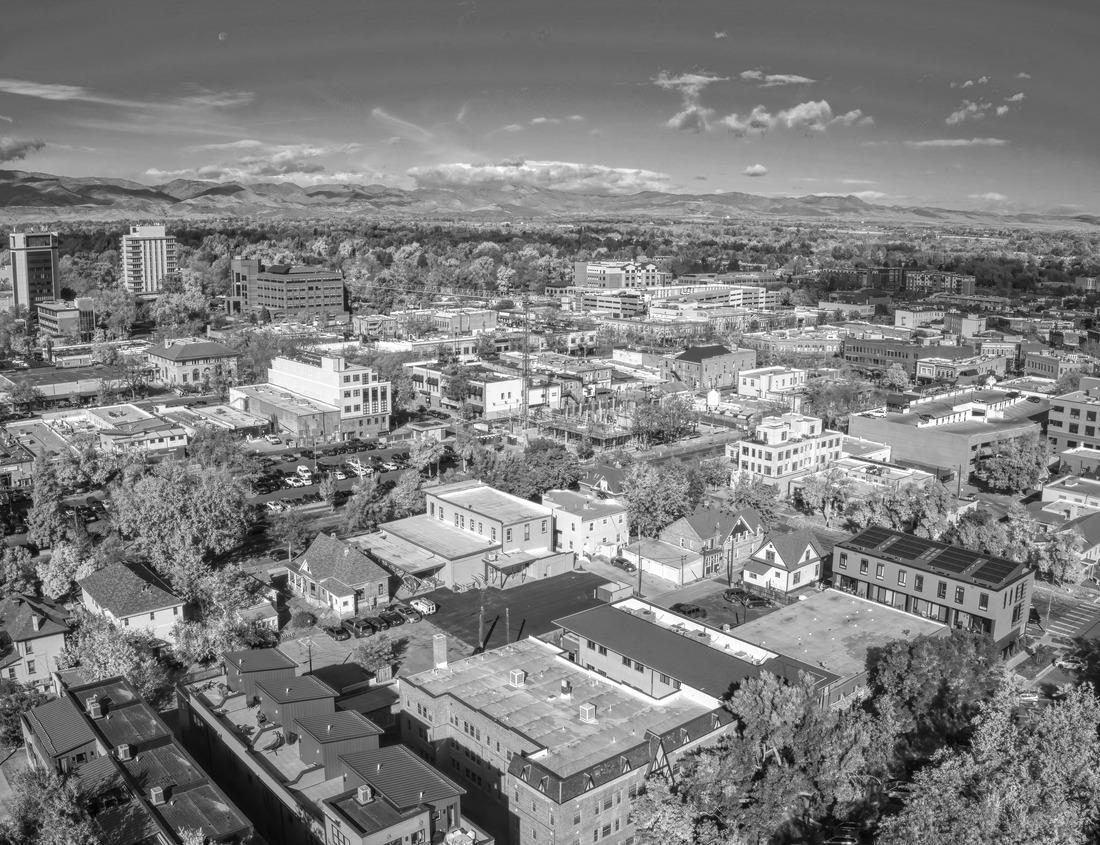 Noah Jigsaw Puzzle Blue and Orange color swirls around in the clouds at sunset over Flagstaff Arizona in black white 1000 pieces