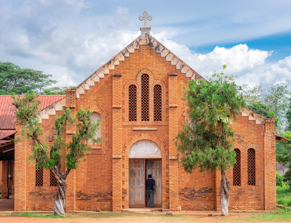Noah Jigsaw Puzzle African man stepping into the doorway of a small church at the Cathedral Bangui, Notre Dame, famous church in the Central African Republic 1000 pieces