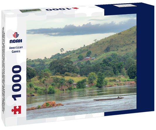 Noah Jigsaw Puzzle African fisherman rowing boat on Ubangi River, fishing in Bangui capital of Central African Republic. Traditional wooden boat made by African villagers 1000 pieces