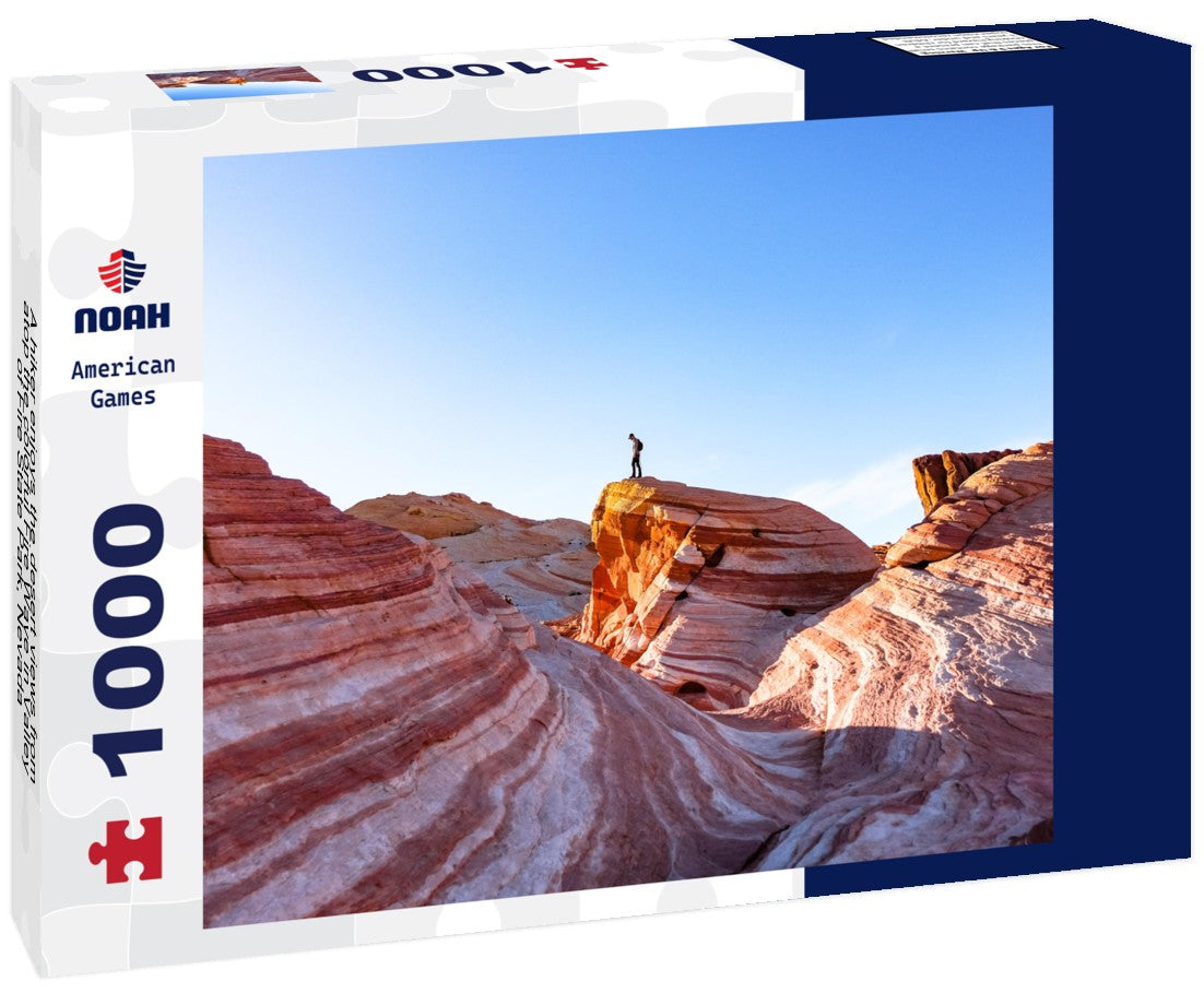 Noah Jigsaw Puzzle A hiker enjoys the desert views from atop the colorful Fire Wave in Valley of Fire State Park, Nevada 1000 pieces