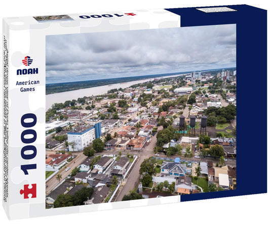 Noah Jigsaw Puzzle Aerial drone view of Porto Velho city center streets with “Praça das tres caixas dagua” square and Madeira river and Amazon rainforest in the background on cloudy winter day. Rondonia state, Brazil 1000 pieces