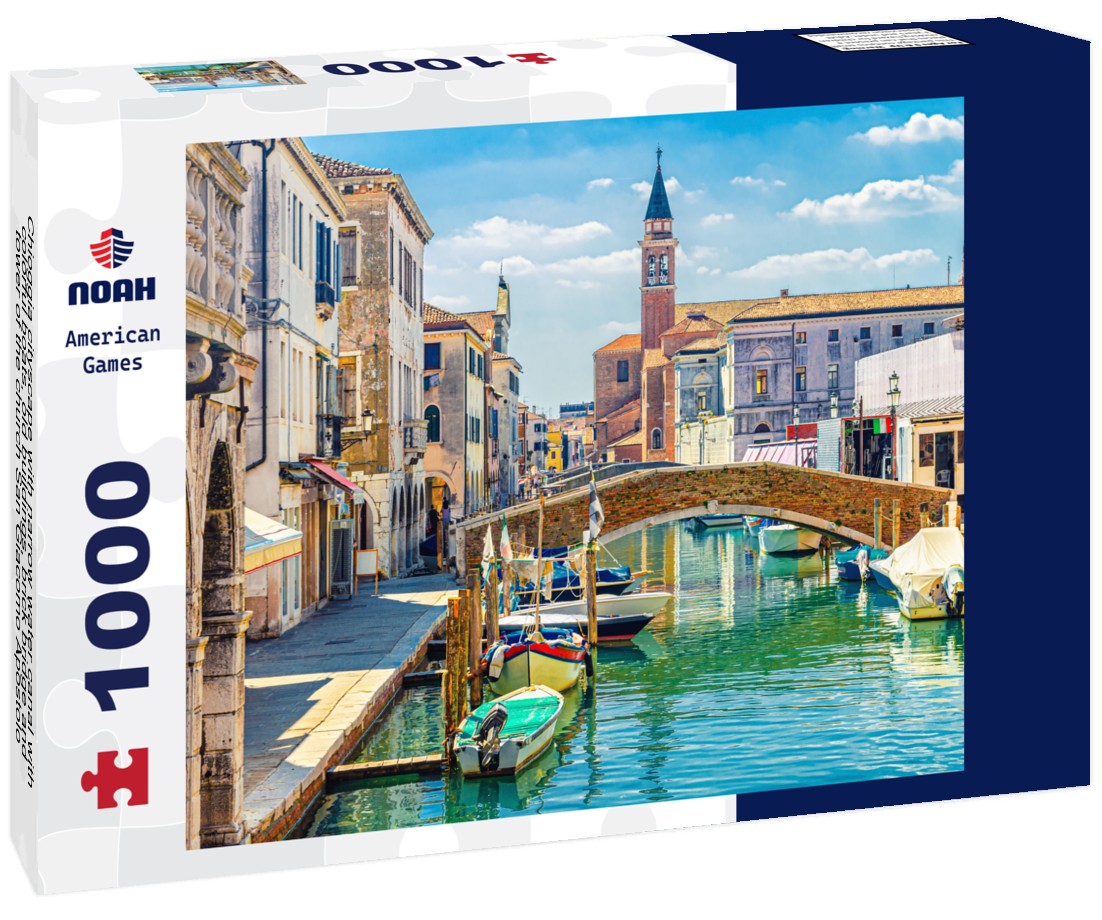 Noah Jigsaw Puzzle Chioggia cityscape with narrow water canal with colorful boats, old buildings, brick bridge and tower of the church San Giacomo Apostolo, blue sky in summer, Veneto region, northern Italy 1000 pieces