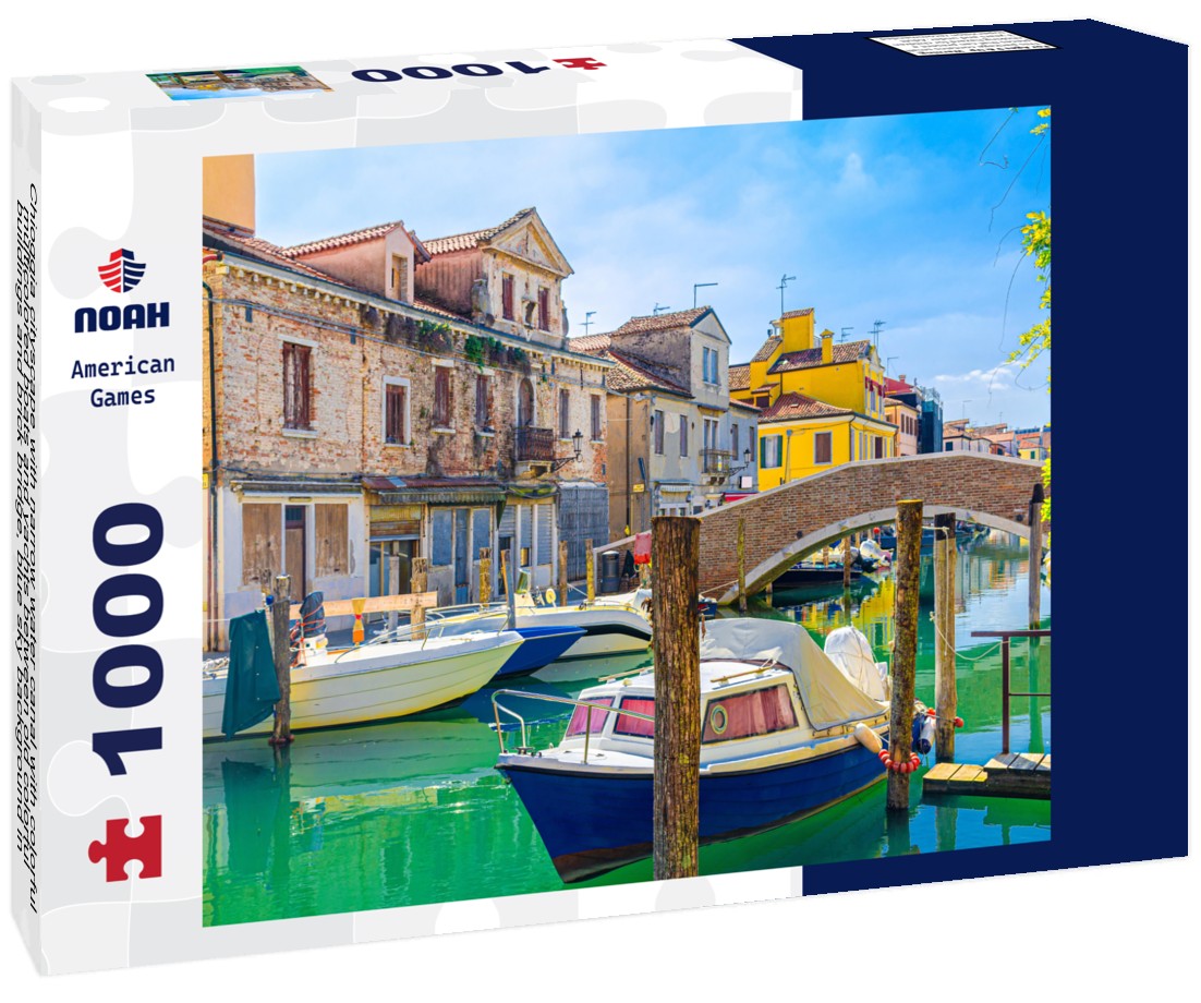 Noah Jigsaw Puzzle Chioggia cityscape with narrow water canal with colorful multicolored boats and yachts between old colorful buildings and brick bridge, blue sky background in summer, Veneto region, northern Italy 1000 pieces