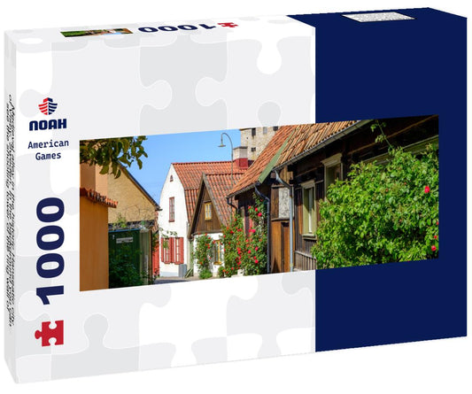 Noah Jigsaw Puzzle Medieval alley in the historic Hanseatic city of Visby, Sweden. In the background you can see the shooting tower of the ring wall of Visby, a UNESCO World Heritage Site panorama 1000 pieces