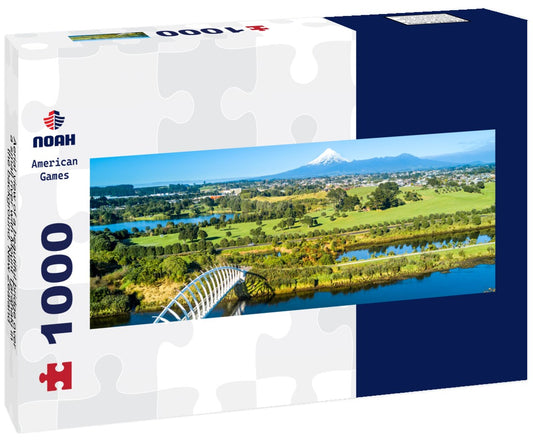 Noah Jigsaw Puzzle Aerial view of a beautiful bridge over a small river with Mount Taranaki in the background. New Zealand Panorama 1000 Pieces