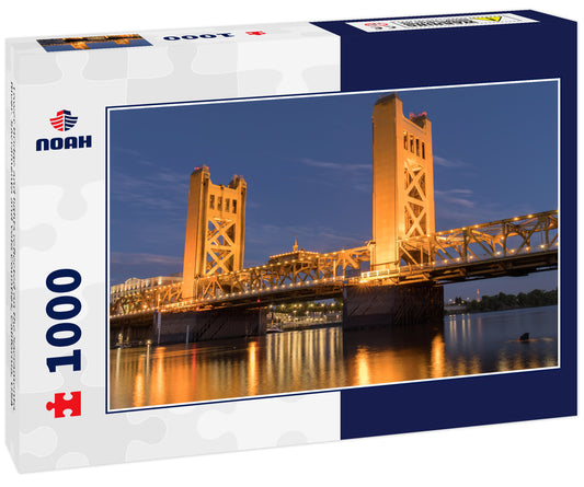 Tower Bridge and lights reflected on the Sacramento River. Sacramento and Yolo Counties, California, USA