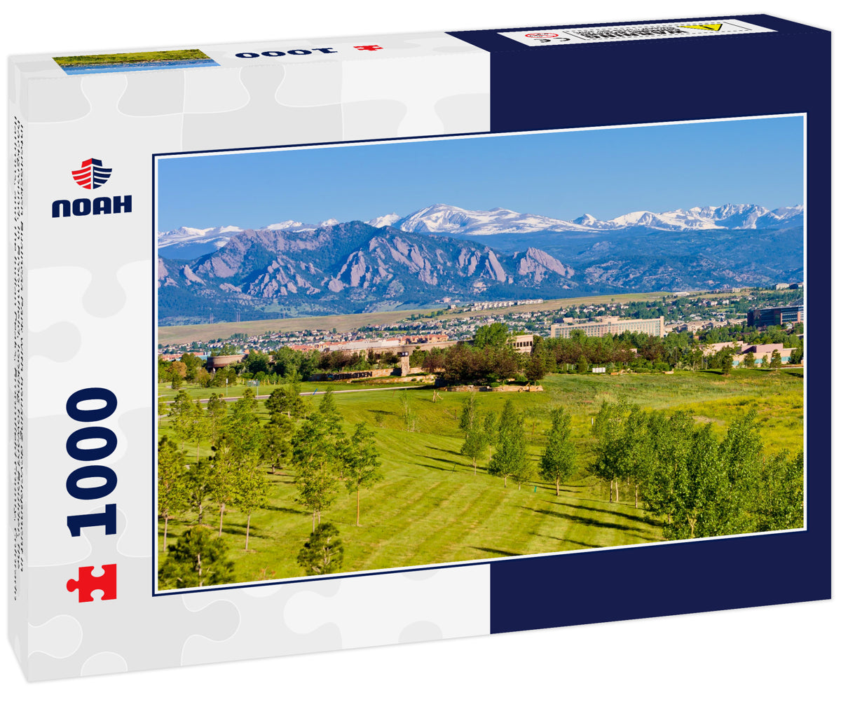 Interlocken Business Park with housing development in background, in Broomfield, looking toward Boulder, the flatirons, and the Indian Peaks, Broomfield County, Colorado