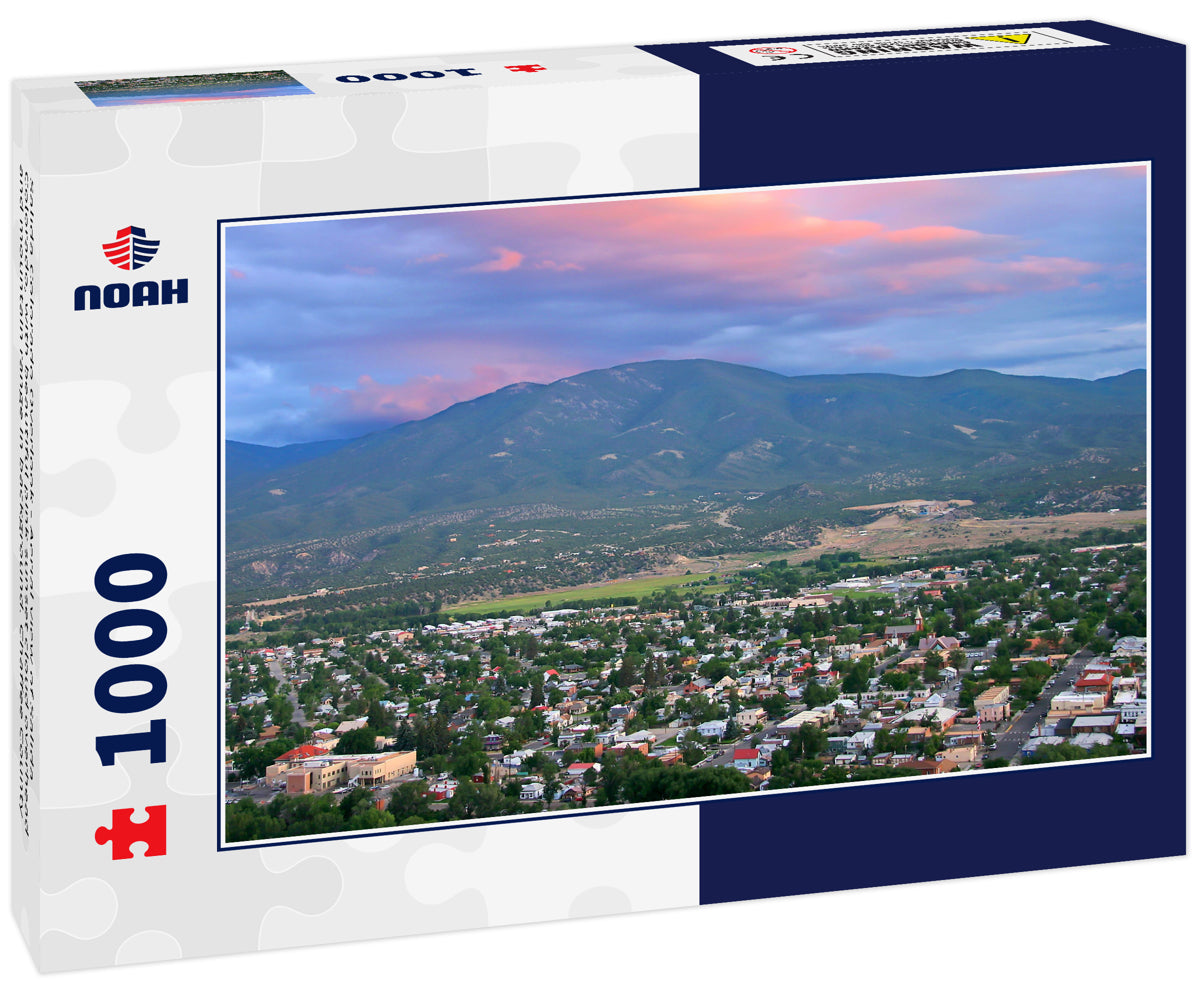 Salida Colorado Overlook - Aerial view of Salida Colorado, with beautiful pink sunset cloud overhead and mountain range in background. Chaffee County