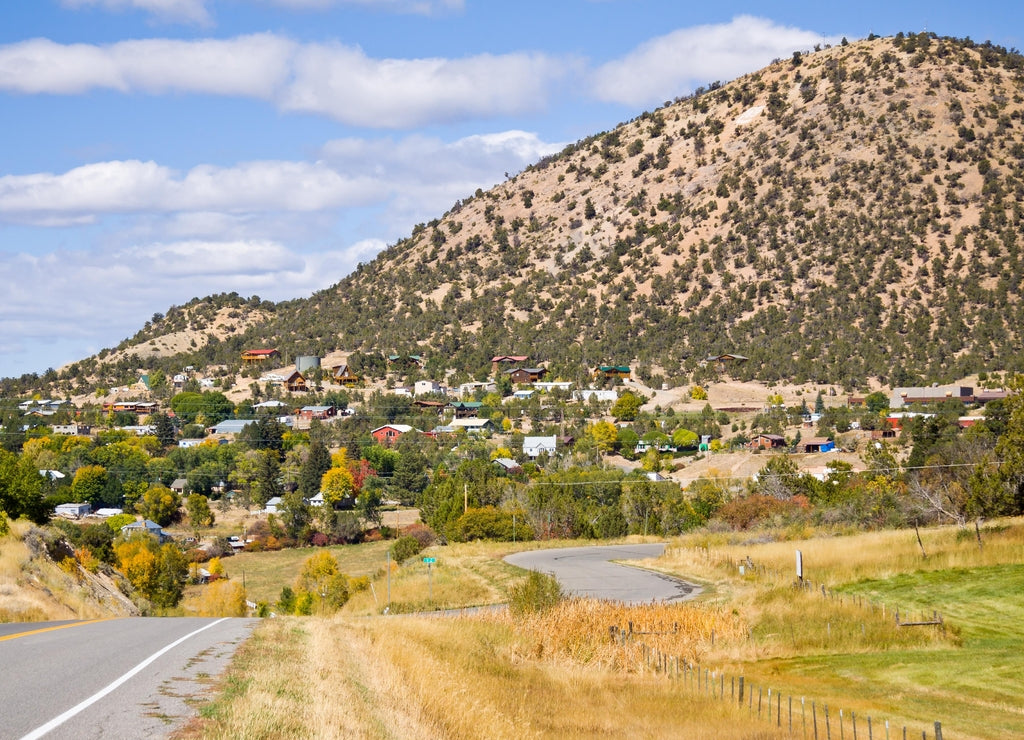 Farming community of Crawford, Colorado with mountains in background, Delta County