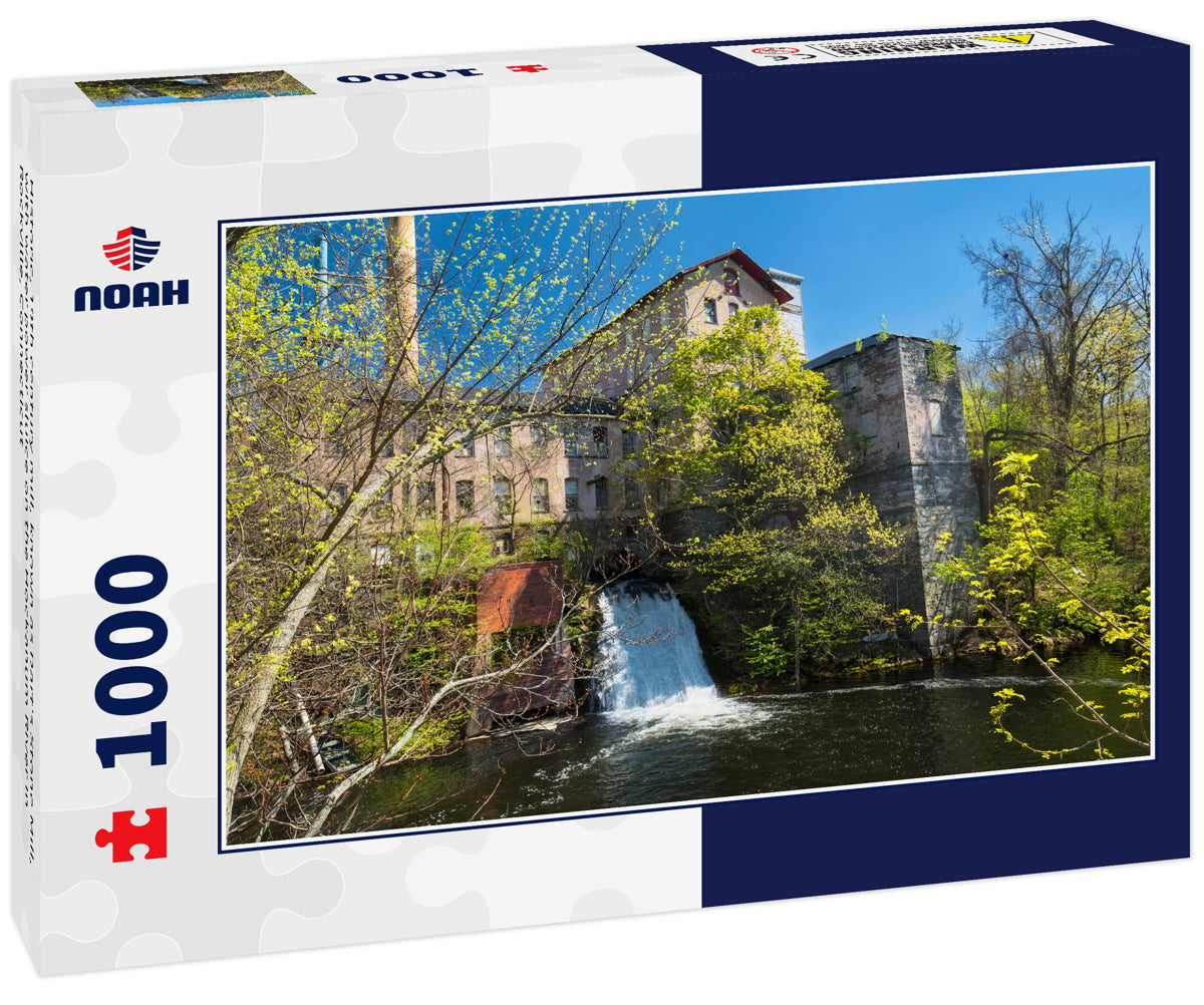 Historic, 19th century mill, known as Dart's Stone Mill, with water power sluice on the Hockanum River in Rockville, Connecticut