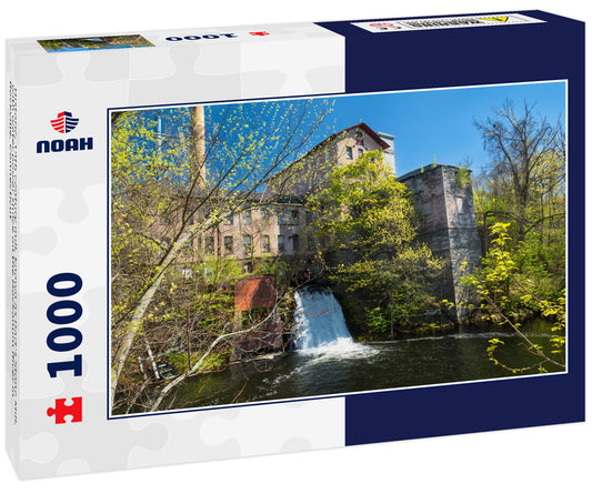 Historic, 19th century mill, known as Dart's Stone Mill, with water power sluice on the Hockanum River in Rockville, Connecticut