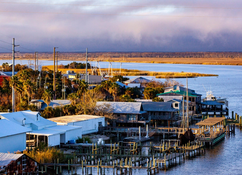 Apalachicola, Florida from the bridge over the Apalachicola River with purple storm clouds in the background