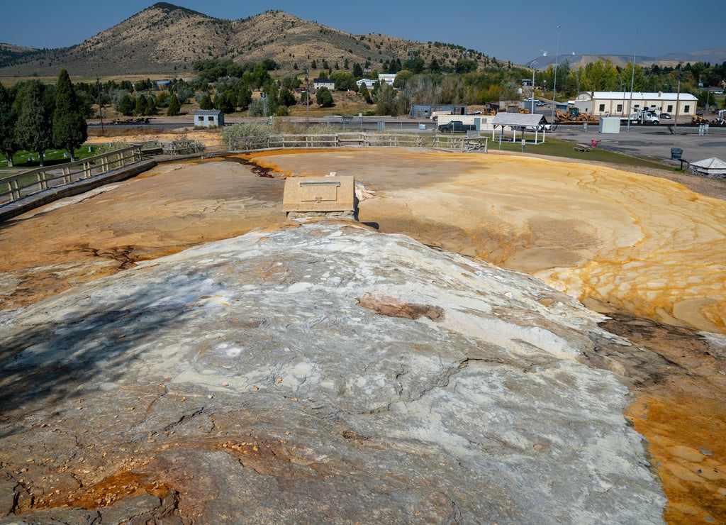Captive geyser in Soda Springs Idaho. Mineral terraces of the hot springs