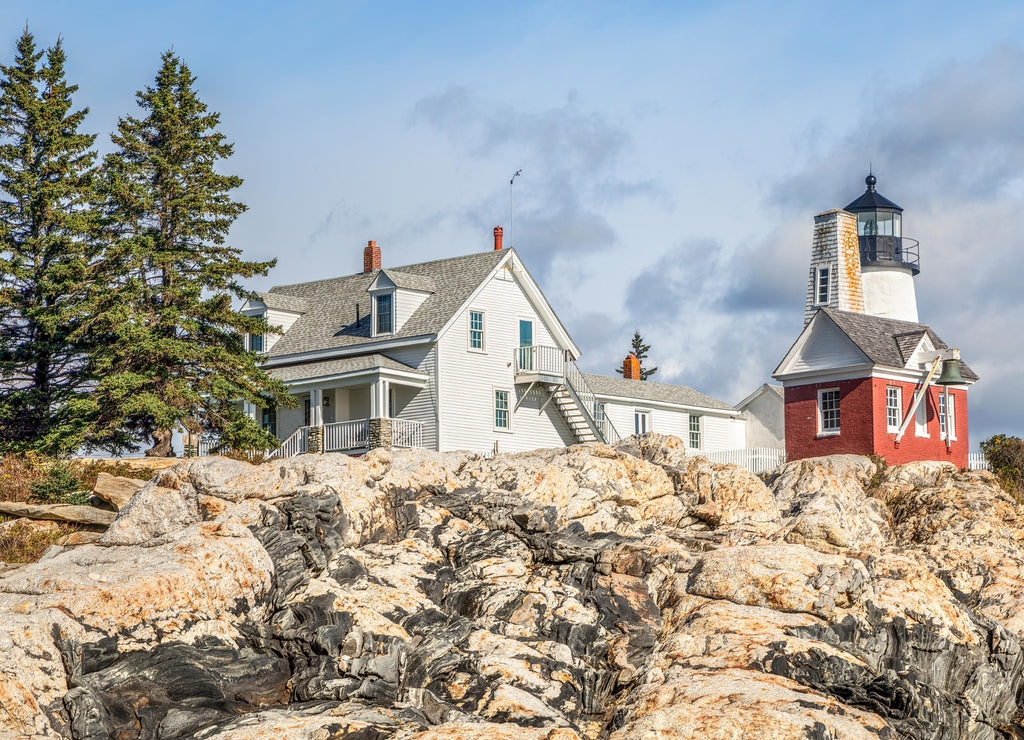 The landmark Pemaquid Point Lighthouse sits atop the rocky Atlantic Ocean coast near Bristol, Lincoln County, Maine