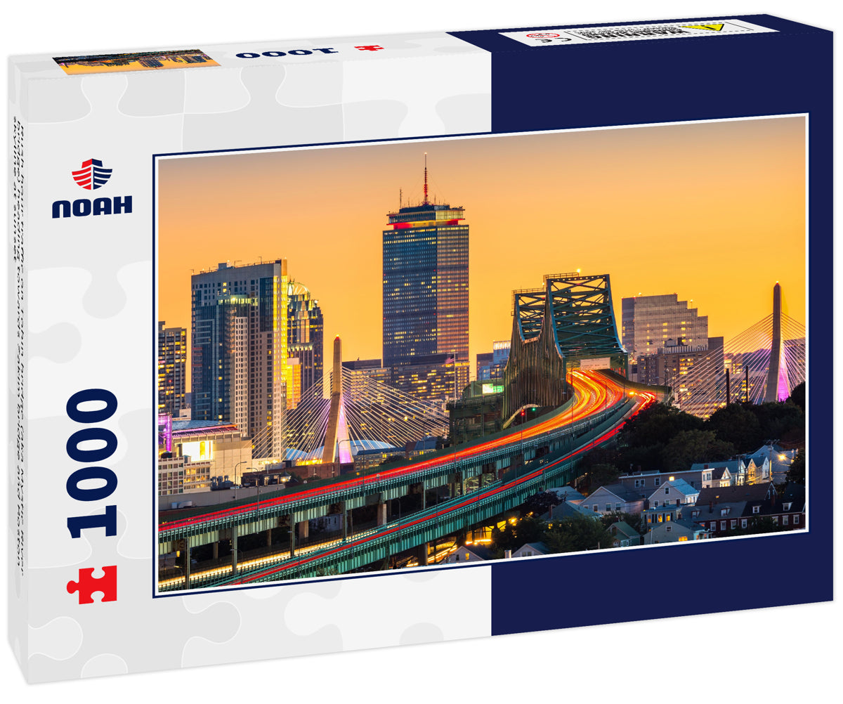 Rush hour traffic on Tobin bridge (aka Mystic River bridge) heading towards Zakim bridge and Boston skyline at sunset