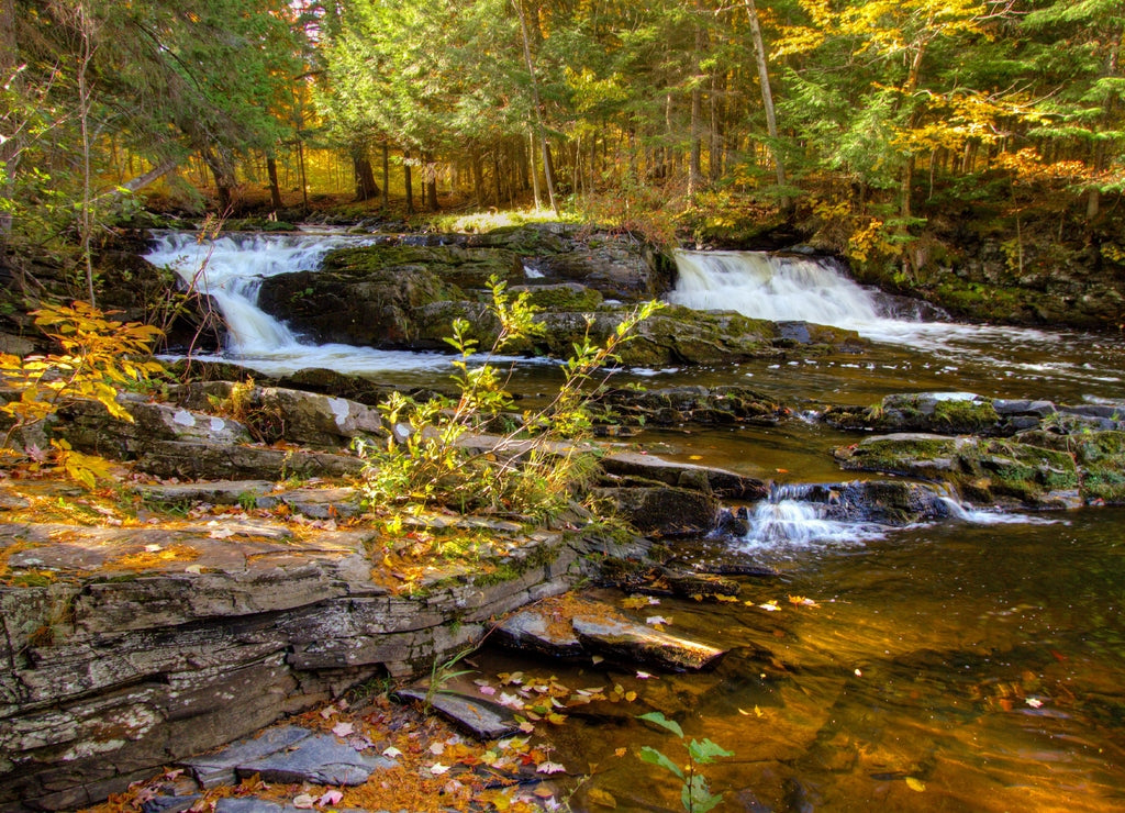 Double Waterfall with fall foliage on the Falls River in the small town of L'Anse in the Upper Peninsula of Michigan