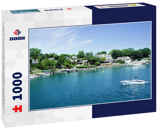 Lakefront homes and boats in the Round Lake in downtown Charlevoix Michigan