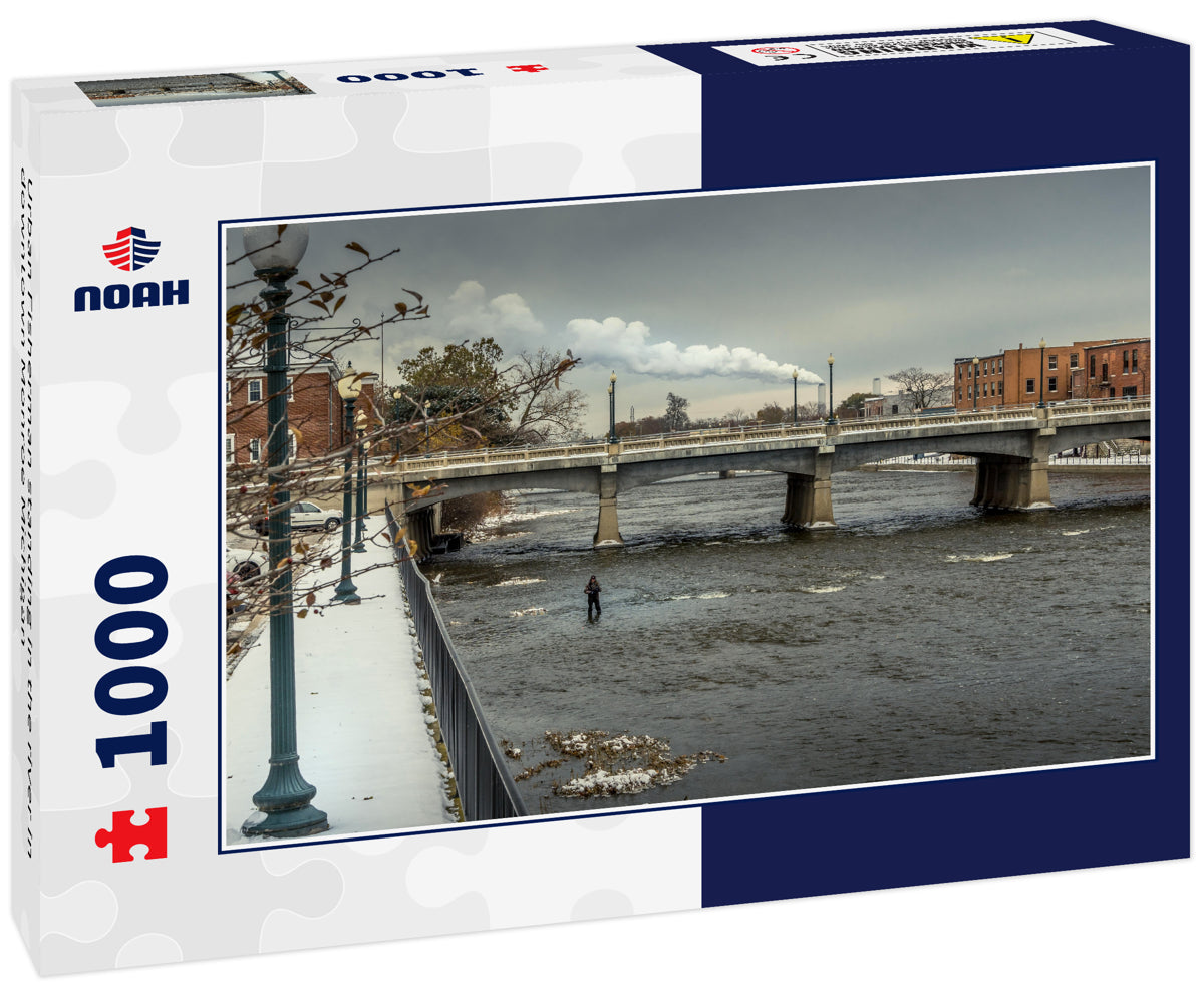 Urban Fisherman standing in the river in downtown Monroe Michigan