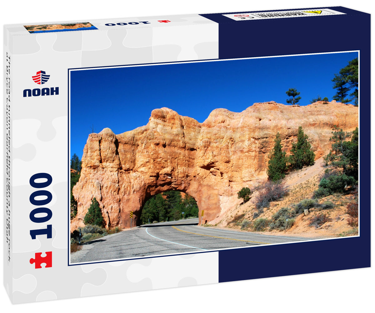 The road tunneled through a huge rock at Bryce Cayon Garfield County Utah