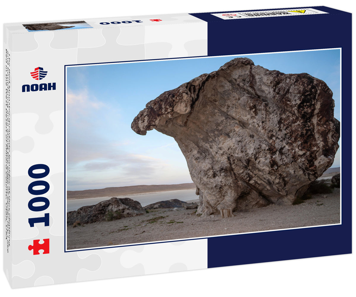 The Red Monster quartzite boulder at Ibex climbing and bouldering area along the edge of Sevier Dry Lake Bed in the West Desert of Millard County, Utah, USA