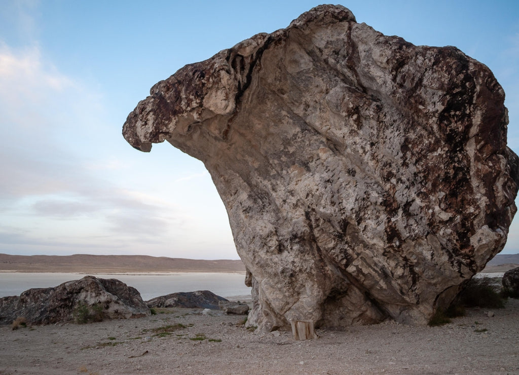 The Red Monster quartzite boulder at Ibex climbing and bouldering area along the edge of Sevier Dry Lake Bed in the West Desert of Millard County, Utah, USA