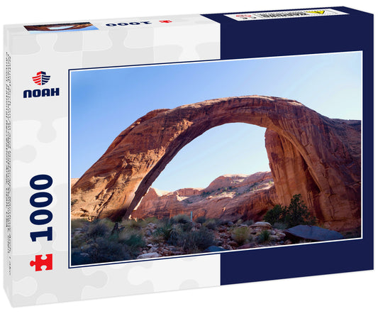 Natural arch on an arid landscape, Rainbow Arch, Lake Powell, Rainbow Bridge National Monument, Glen Canyon National Recreation Area, Utah, USA