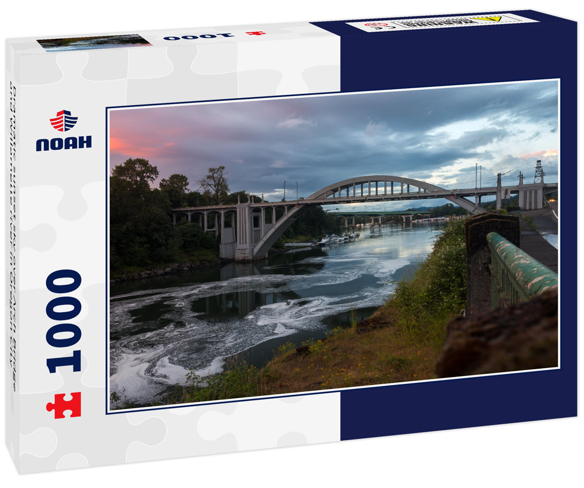 Dramatic sunset sky over Arch Bridge and Willamette river in Oregon City