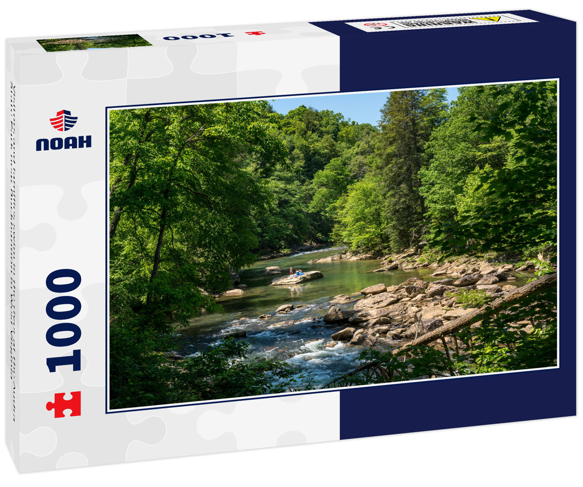 Visitors and families swim in the river at the Audra State Park near Buckhannon in West Virginia