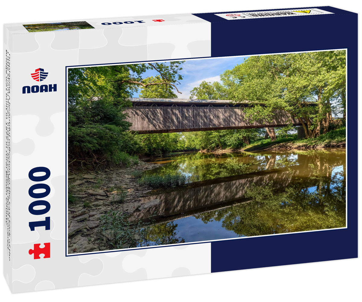 Displaying a beautiful reflection in the East Fork of the Little Miami River, historic McCafferty Road Covered Bridge was built in 1877 in rural Brown County