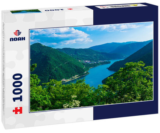 Summer landscape of lake and river Piva between high green mountains near Pluzine. Montenegro