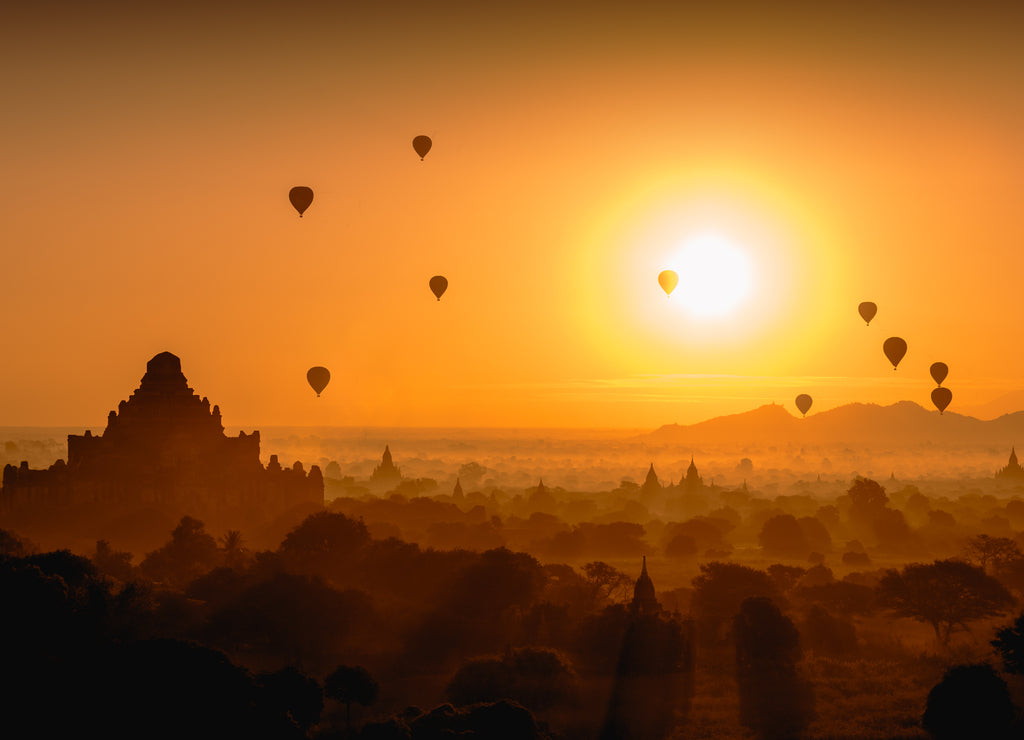 Beautiful sunrise and hot air balloons over ancient pagoda in Bagan is old kingdom in past, Myanmar