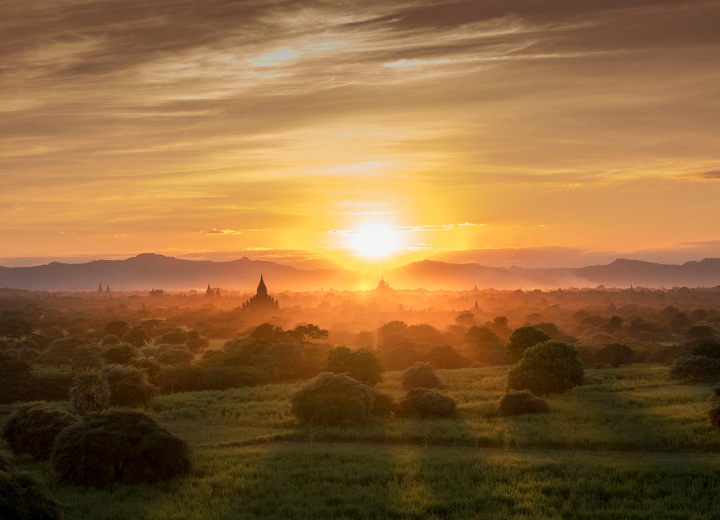 Sunset landscape view with silhouettes of old Bagan temples, at Bagan Archaeological Zone Bagan Mandalay Myanmar (Burma)