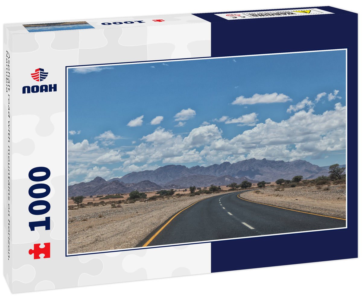 Asphalt road with mountains on horizon, Namibia
