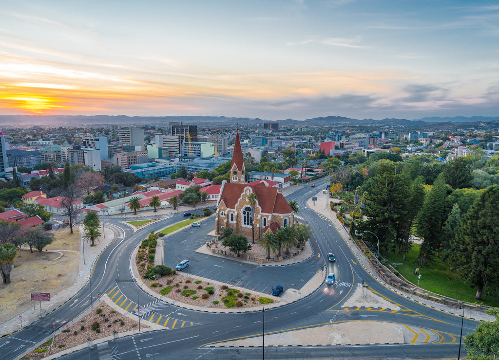 Aerial view of historical landmark Christ Church aka Christuskirche at sunset in Windhoek, the capital and largest city of Namibia