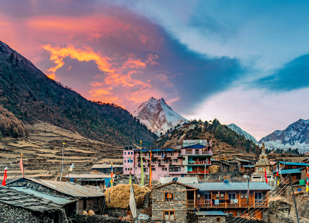 Beautiful dramatic sunset over Mount Manaslu in Himalaya mountains, Nepal. Manaslu circuit trek in December.