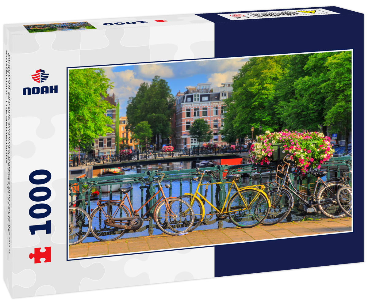 Beautiful vibrant summer flowers and bicycles on a bridge on the famous world heritage canals of Amsterdam, The Netherlands