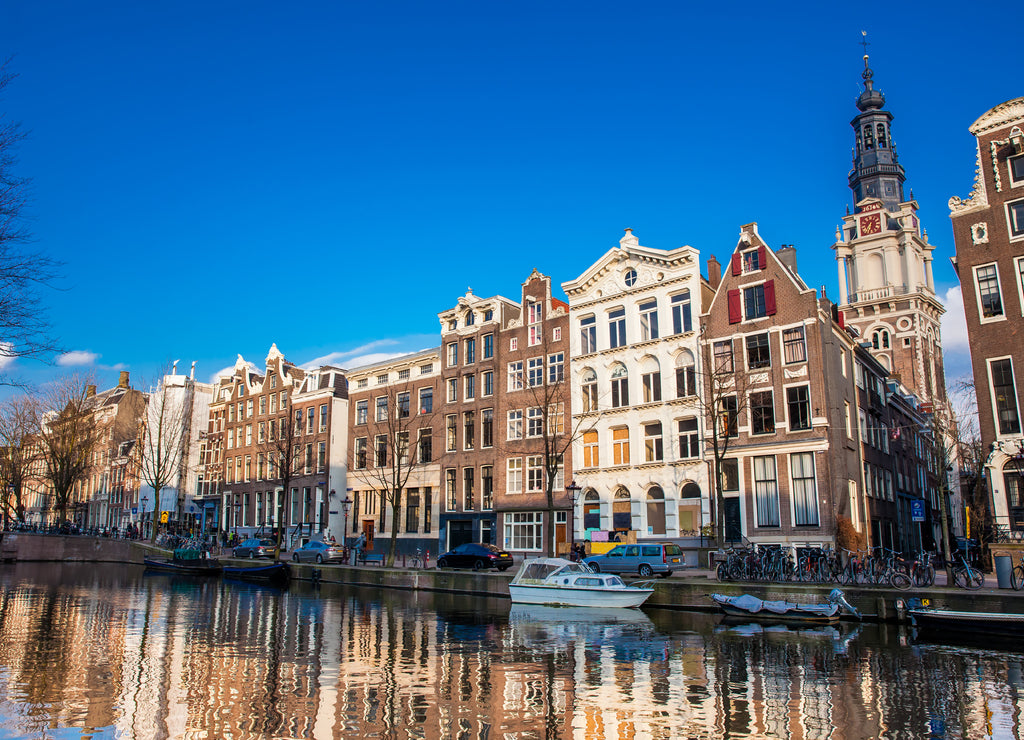 Canals, boats and beautiful architecture at the Old Central district in Amsterdam